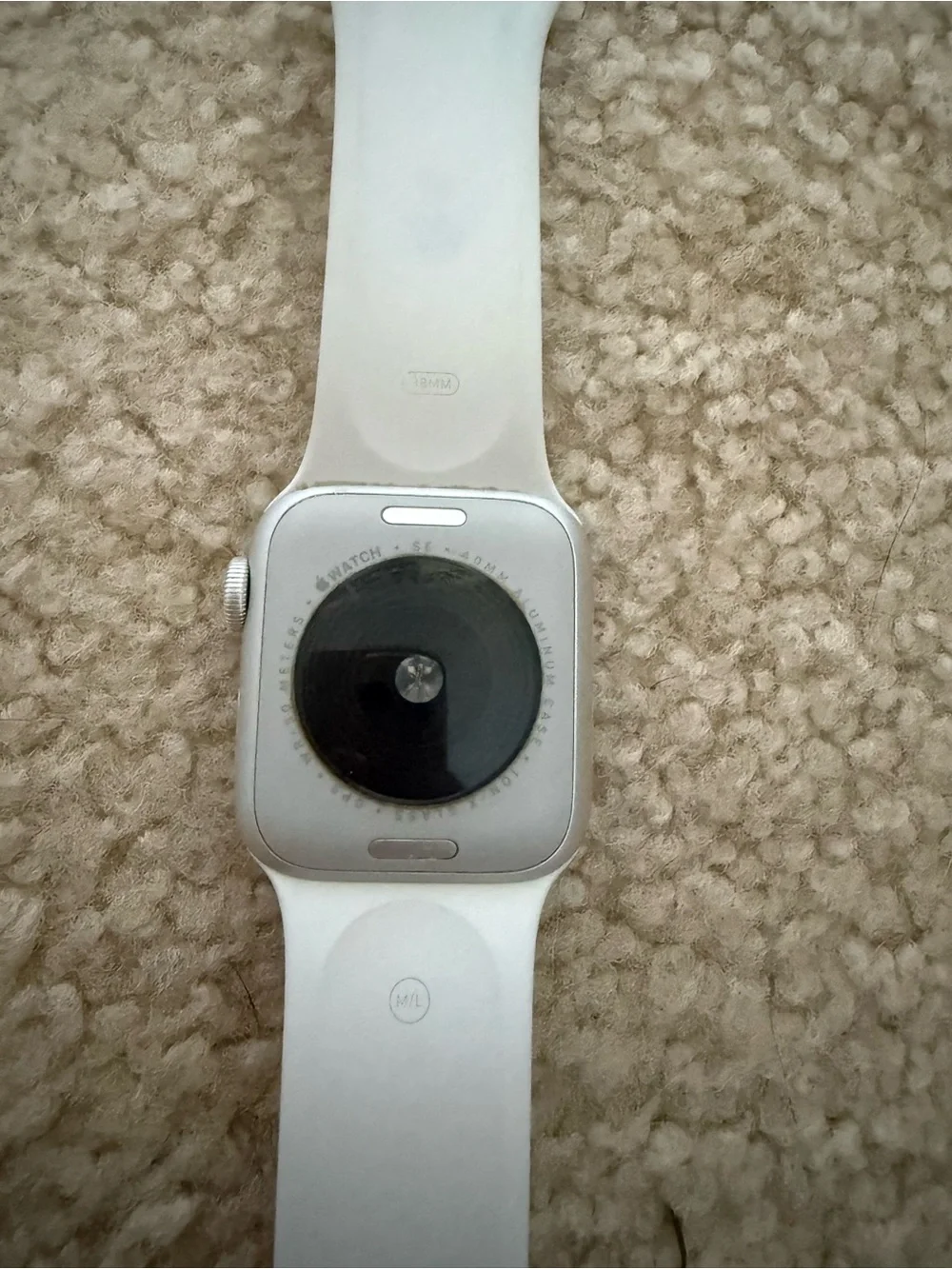 White Smartwatch with Extra Navy Band and Charger